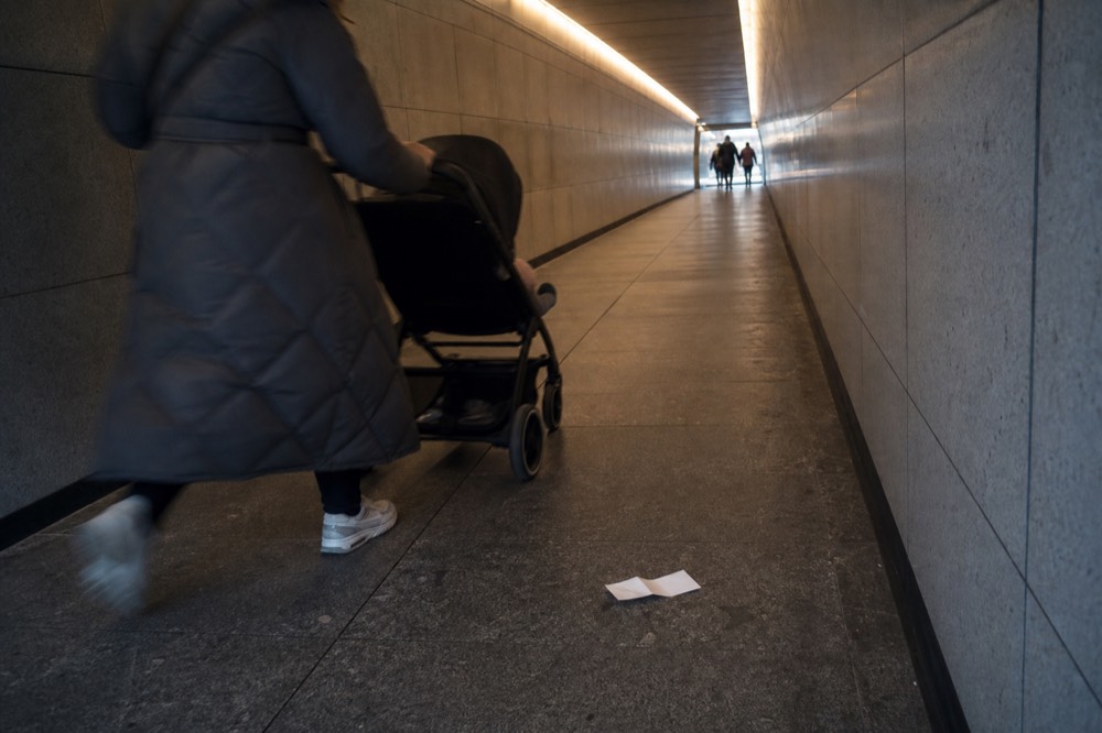 Sheltered walkway between a Kuala Lumpur mall and convention centre, no text, no logos, no people